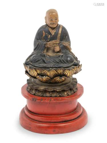 A Japanese Lacquered Wood Figure of a Seated Monk Total heig...