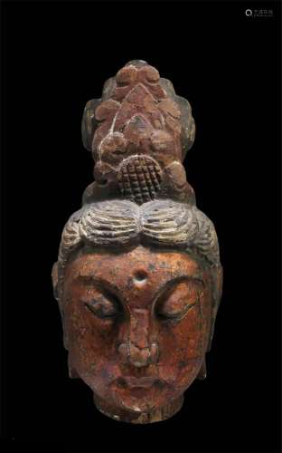 A Carved Wooden Guanyin Head A Carved Wooden Guanyin Head. H...