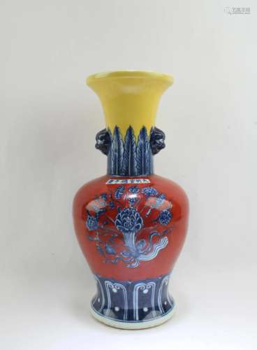 Chinese Porcelain Vase Chinese Porcelain Vase, flanked by tw...