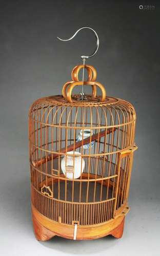 A Carved Bamboo Bird Cage A Carved Bamboo Bird Cage. Height:...