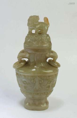 A Carved Jade Vase A Carved Jade Vase with lid. Height: 5.25...