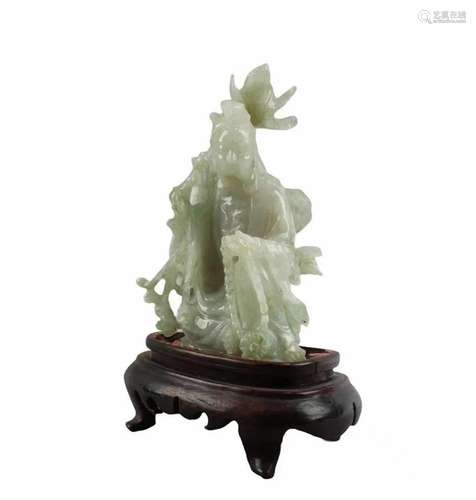 A Carved Jade Guanyin Figurine A Carved Jade Guanyin Figurin...