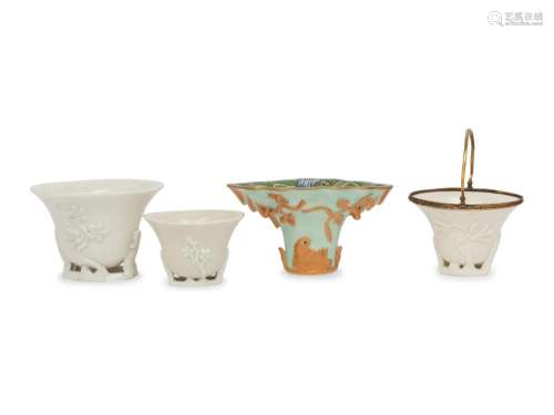 Four Porcelain Libation Cups Height of largest 3 in., 7.6 cm...