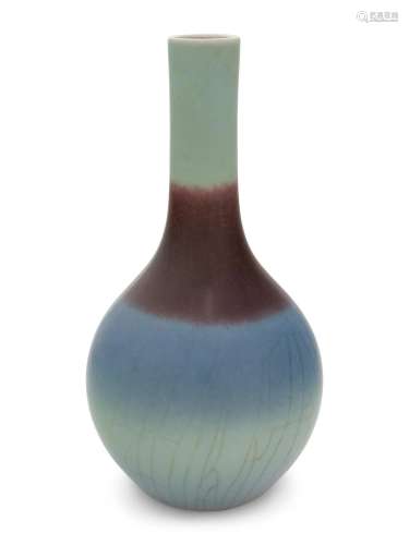 A Flambé Glazed Porcelain Bottle Vase Height 9 in., 23 cm.