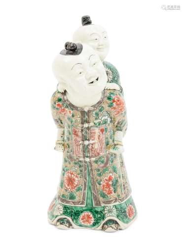 A Chinese Famille Verte Biscuit Porcelain 'Piggyback&#x...