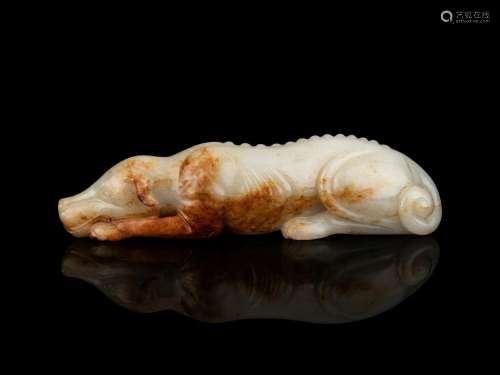 A White and Russet Jade Figure of a Recumbent Dog Length 7 1...