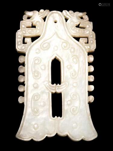 A Celadon Jade Bell-Form Pendant Length 3 in., 7.5 cm.