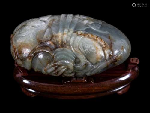 A Grey and Russet Jade Purse-Form Paperweight Length 4 1/2 i...