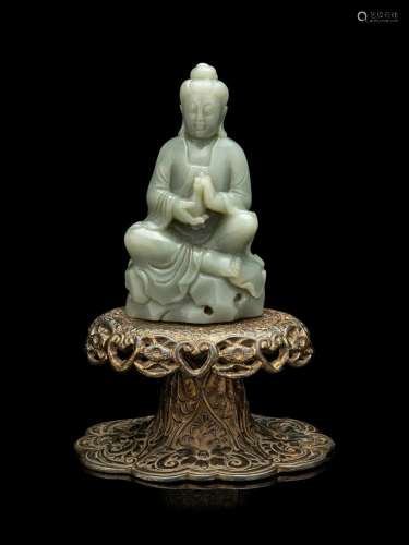 A Celadon Jade Figure of Seated Guanyin Height 7 in., 17.8 c...