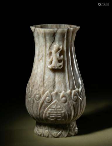 A Chicken Bone Jade 'Lotus' Vase Height 8 in., 20....