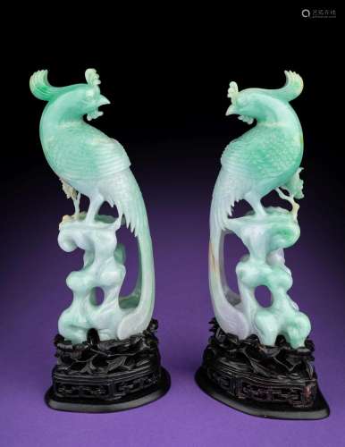 A Pair of Semi-Translucent Green Jadeite Figures of Phoenix ...