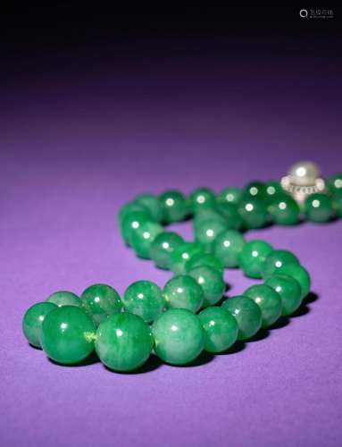 A Green Jadeite and Pearl Beaded Necklace Length 9 1/4 in., ...
