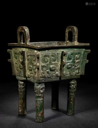 An Archaic Bronze Food Vessel, Fangding Height 8 7/8 x width...