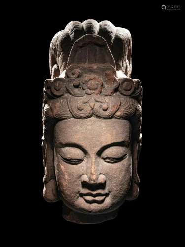 A Carved Stone Head of Guanyin Height overall 29 in., 74 cm.