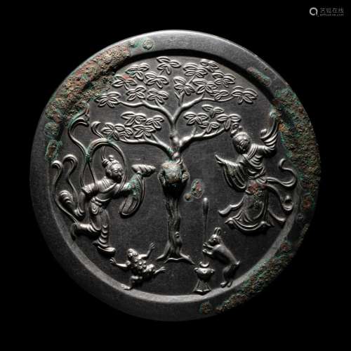 A Bronze 'Moon Palace' Mirror Diameter 6 3/8 in., ...