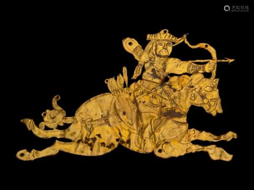 A Gold 'Equestrian' Ornament Length 4 in., 10 cm.