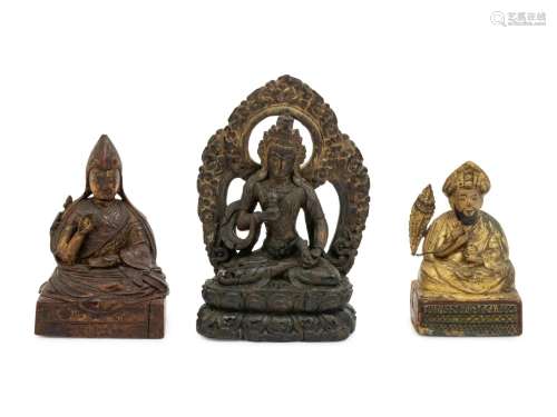 Three Sino-Tibetan Carved Wood Seated Figures Height of tall...