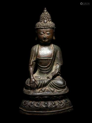 A Bronze Figure of Seated Buddha Height 10 in., 25.4 cm.