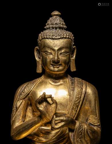 A Sino-Tibetan Gilt Bronze Seated Figure of Buddha Shakyamun...