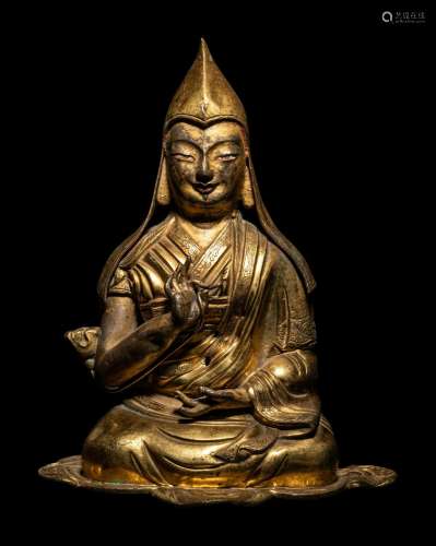 A Tibetan Gilt Bronze Repoussé Seated Figure of Tsongkhapa H...