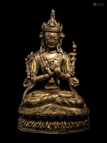 A Tibetan Gilt Bronze Seated Figure of Maitreya Height 9 3/4...