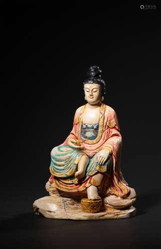 A CARVED SOAPSTONE FIGURE OF GUANYIN,QING DYNASTY