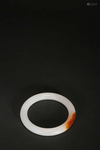 A WHITE AND RUSSET JADE BANGLE,QING DYNASTY