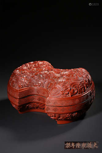 A CARVED CINNABAR LACQUER ‘PLUM BLOSSOM’BOX,AND COVER,MARK A...