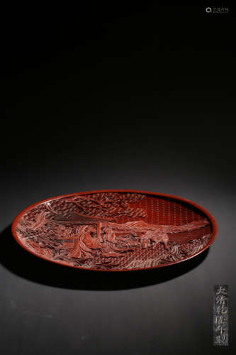 A CARVED CINNABAR LACQUER ‘LANDSCAPE’DISH,MARK AND PERIOD OF...