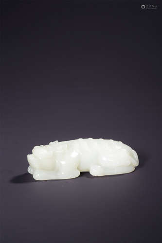 A CARVED WHITE JADE MYTHICAL BEAST,QING DYNASTY