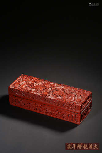 A CARVED CINNABAR LACQUER ‘DRAGON’BOX,MARK AND PERIOD OF QIA...