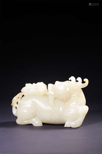 A WHITE JADE CARVING OF‘QILIN BEARS BOOKS’QIANLONG PERIOD