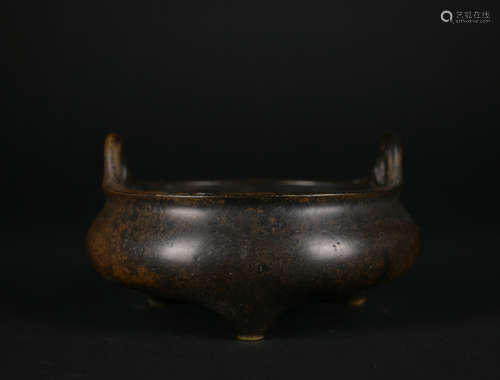 A bronze censer