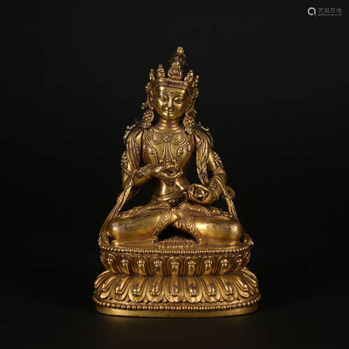 A gilt-bronze statue of Vajrapani