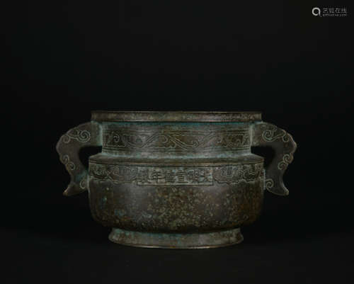 A bronze censer