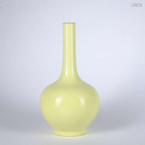 A yellow glazed vase