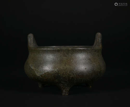 A bronze censer