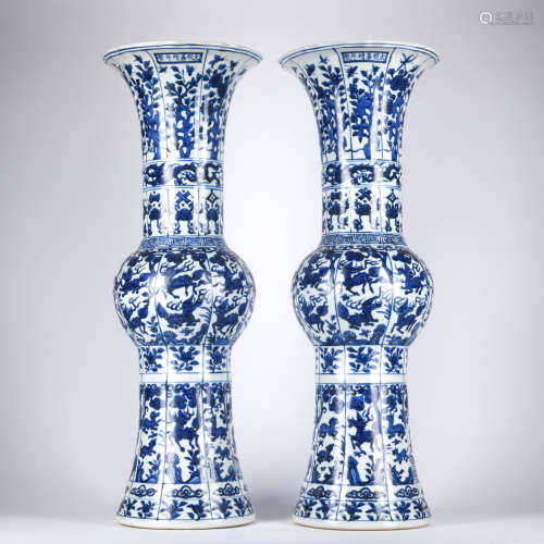 A pair of blue and white 'beast' vase