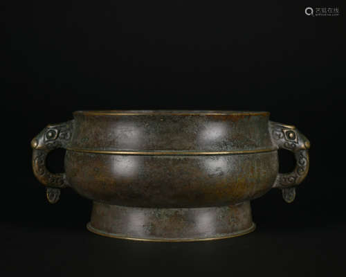 A bronze censer