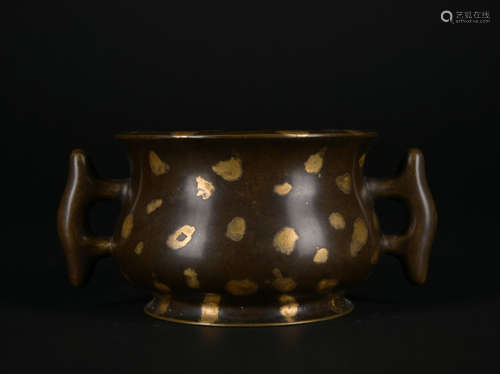 A bronze censer