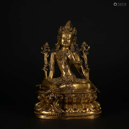 A gilt-bronze statue of Avalokiteshvara