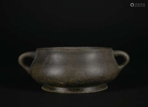 A bronze censer