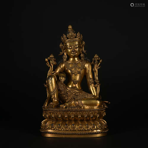 A gilt-bronze statue of Avalokiteshvara