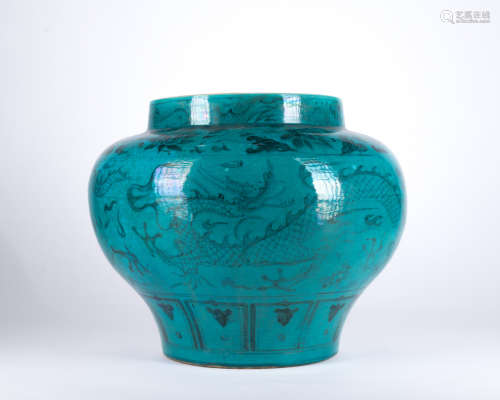 A blue and white green glazed 'dragon' jar