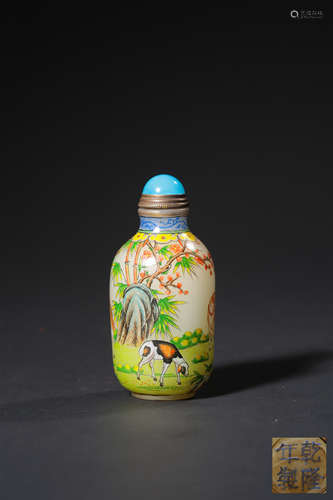 A FAMILLE ROSE PAINTED ENAMEL SNUFF BOTTLE,MARK AND PERIOD O...