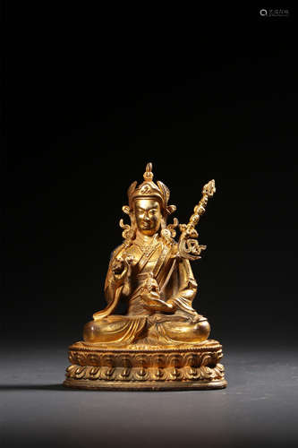 A  GILT-BRONZE FIGURE OF PADMASAMBHACA,QING DYNASTY