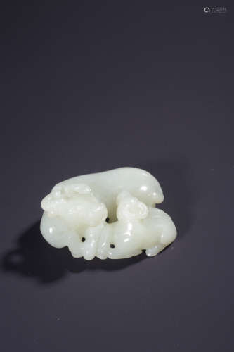 A CARVED WHITE JADE BUFFALO,QING DYNASTY