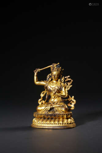 A GILT-BRONZE FIGURE OF MANJUSHRI,QING DYNASTY