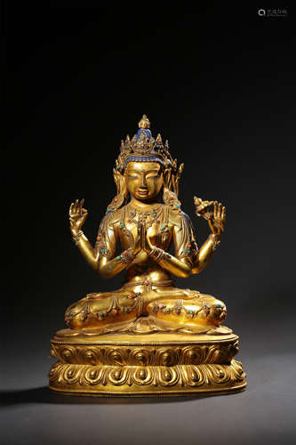 A GILT-BRONZE FIGURE OF GUANYIN QIANLONG PERIOD