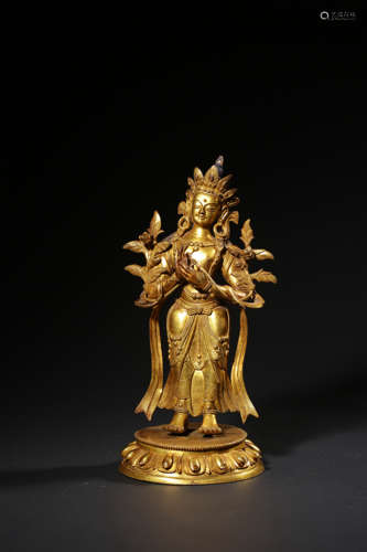 A GILT-BRONZE FIGURE OF TARA QING DYNASTY